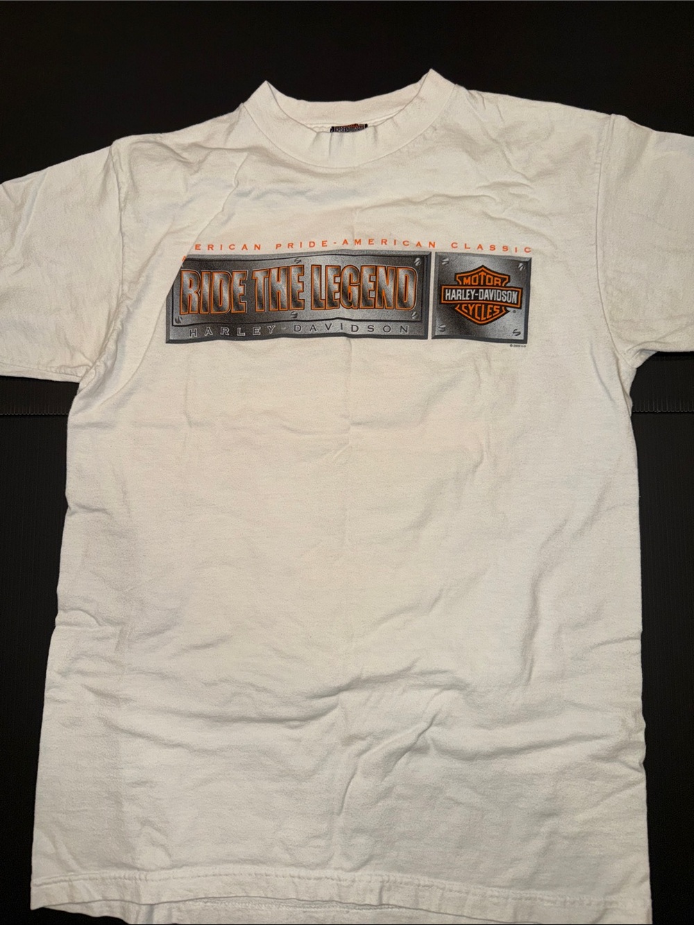 Harley-Davidson White T-Shirt with Orange and Black 'Ride The Legend' Graphic